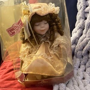 Wind up musical collection doll